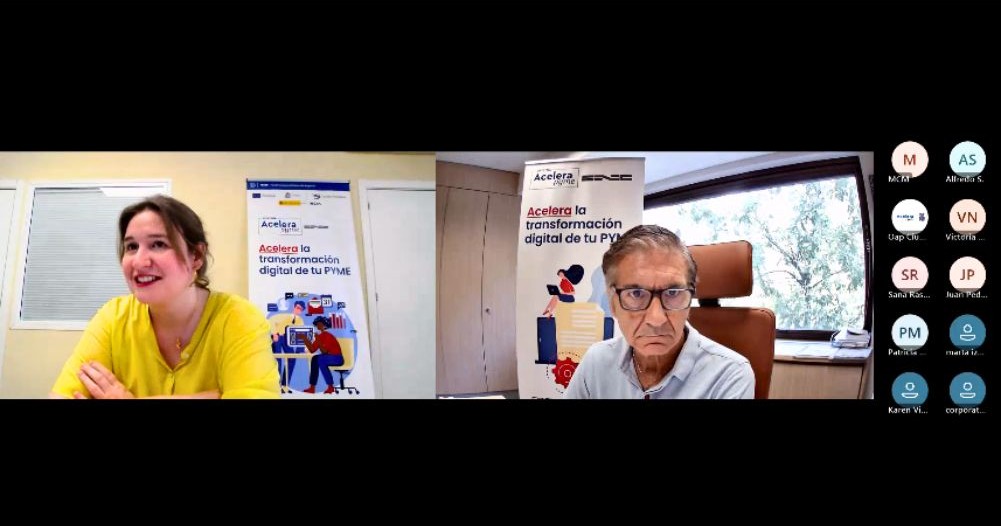 Split-screen video call: a woman in a yellow shirt on the left and a bespectacled man on the right, with banners behind and a participant list on the side.